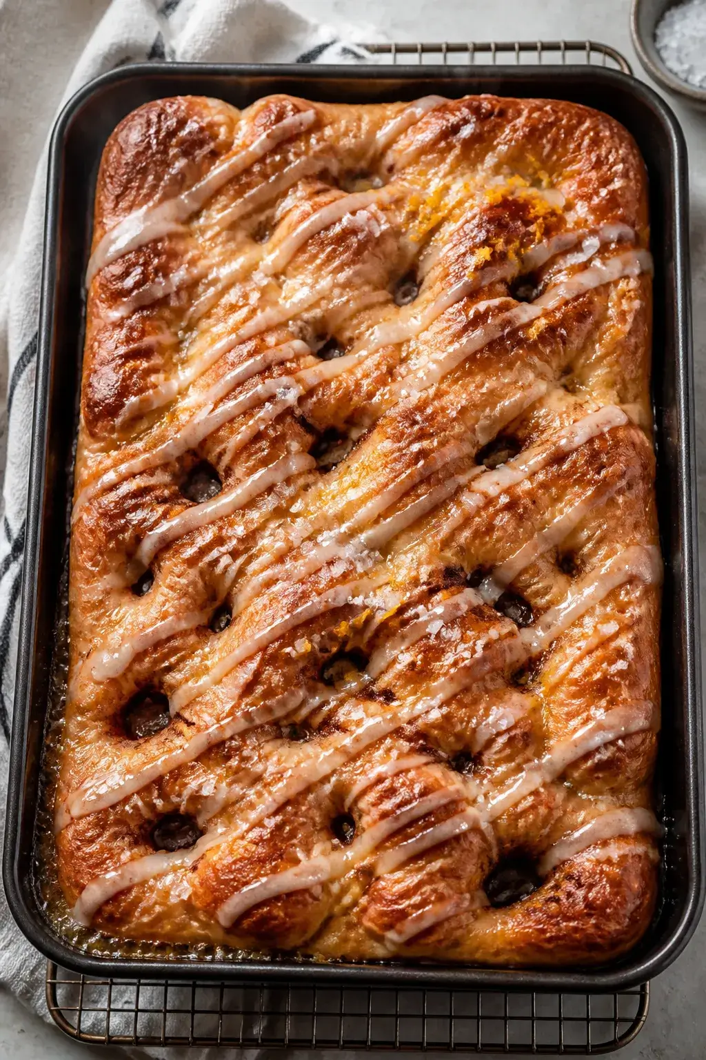 Overhead shot of freshly baked cinnamon roll sourdough focaccia just out of the oven in a 9x13 pan, 